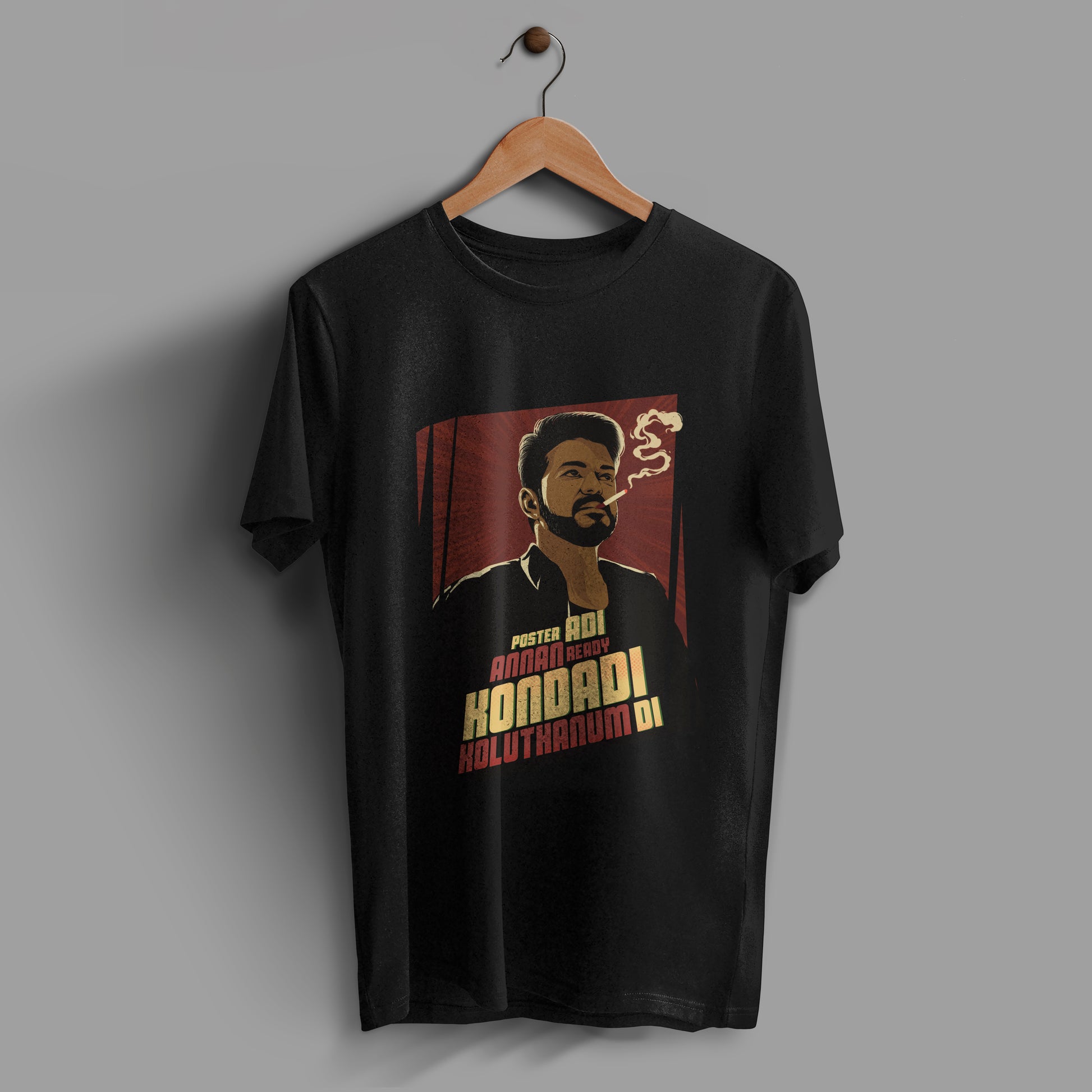 Black t-shirt with a picture of Thalapathy Vijay smoking a cigarette.And there is also a line from naa ready song "Poster adi annan ready, kondadi koluthanum di" is written on the t-shirt. The design is placed on the center of the tshirt.